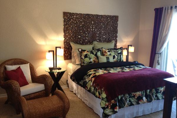 Queen Bed w/down comforter, lounge chair in private room off covered deck.