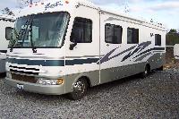 2003 Fleetwood Fiesta, Class A, 32' long w/slide-out, hydraulic leving jacks, back-up camera, etc.