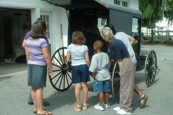 Examining an Amish carriage