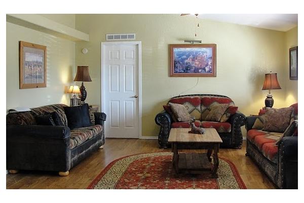 LR  3 sofas w pull out queen, flat screen tv