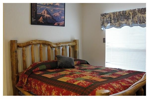 queen log bedroom w 1/2 bath