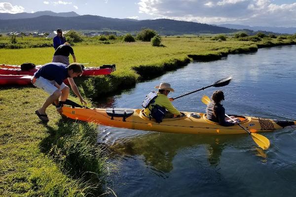 A kayak for 2 Paddlers. Life Jackets and Paddles provided. 