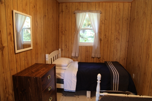 Cottage 4 has a double bed and 2 twin beds