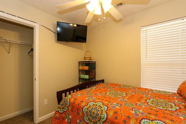 Full-size bed with flat screen tv and cable access