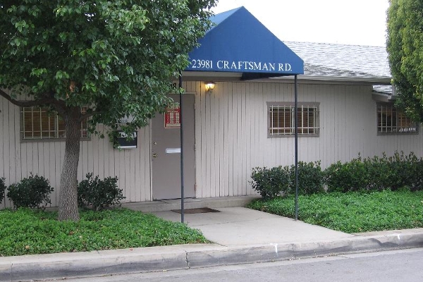 Find us under the blue awning.