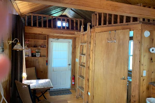 Consuelo Cabin Sleeping Loft and sitting area