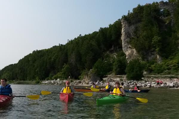Kayaks in front of Arch Rock