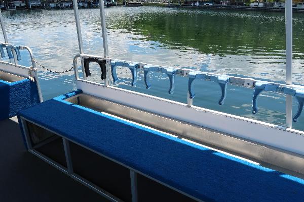 Tank racks line the side of the boat