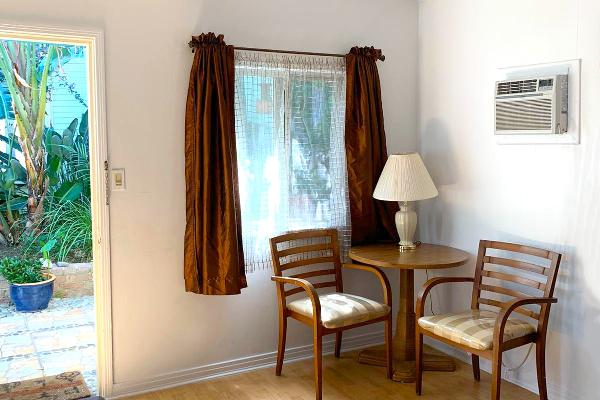 Dining table for two and new hardware floors.