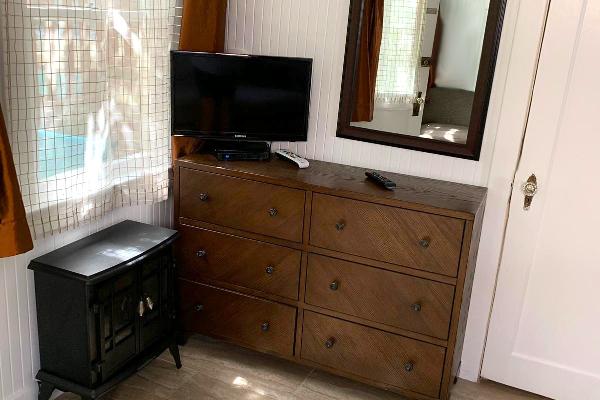 Beautiful new dresser and plasma TV.