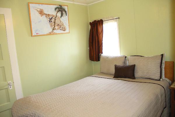 Queen bed (sleeps 2) in private room.