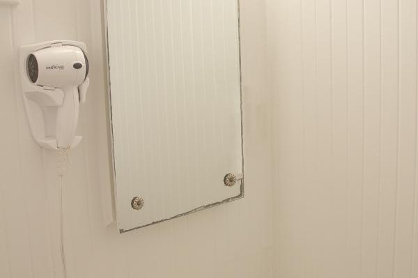 Bathroom with blow dryer.