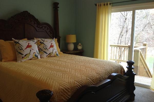 1st Master bedroom on main level with king bed