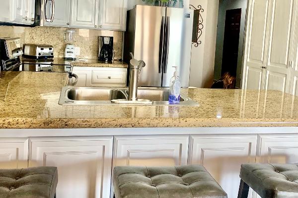 Remodeled kitchen with stainless steel appliances