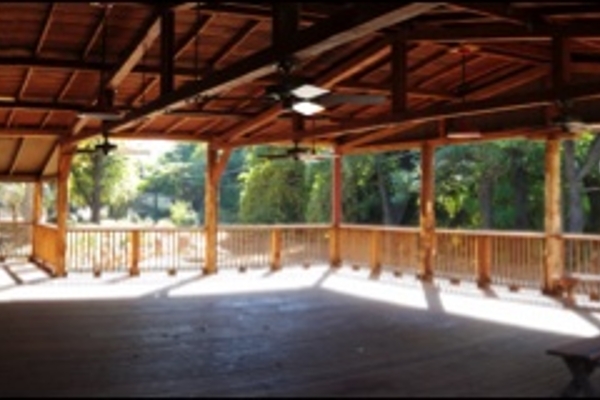 The covered river deck is situated on the backside of the Myrtle Johnston Lodge and overlooks the American River.