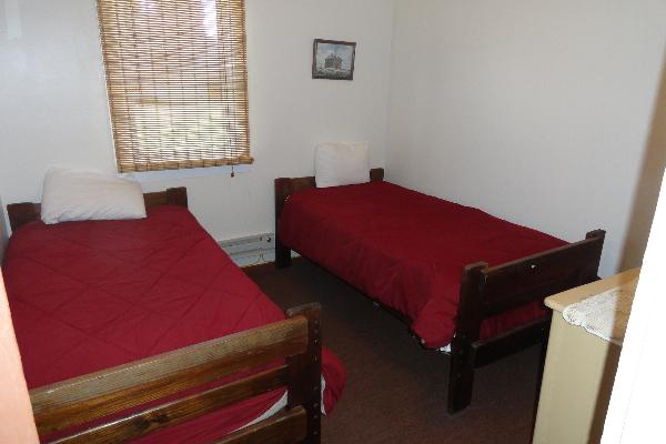 One of three bedrooms in Tan Cottage