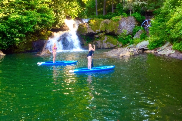 Paddleboarders in front of Norton Falls