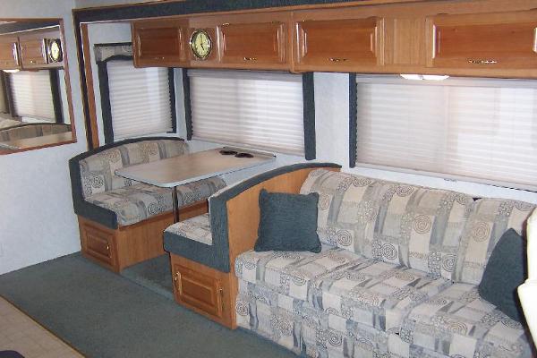 Dinette Table converts to twin bed, Couch converts to queen sofa bed