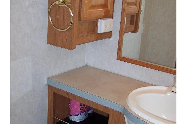 Full Bath with Sink, toilet, tub/shower & plenty of cabinet space