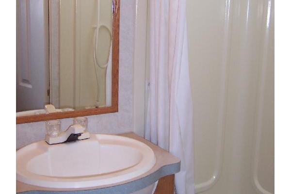 Full Bath with Sink, toilet, tub/shower & plenty of cabinet space