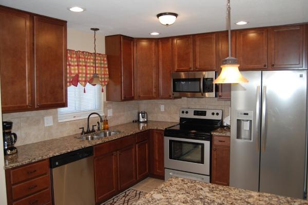 Updated kitchen with granite, tile and stainless steel appliances