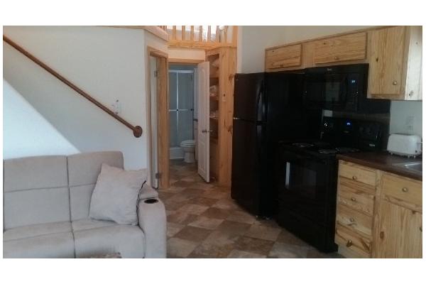 Living Room, Kitchen Area, and Stairs to Loft