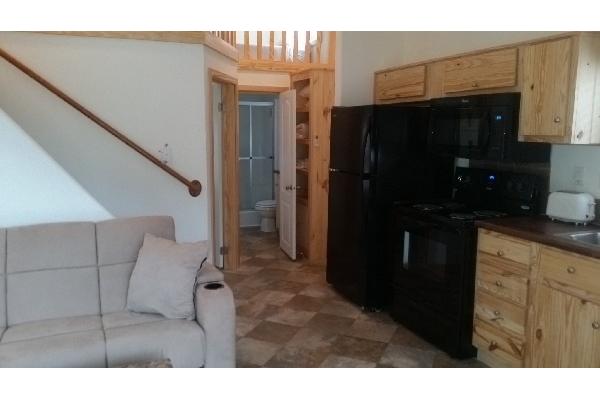 Living Room, Kitchen Area, and Stairs to Loft