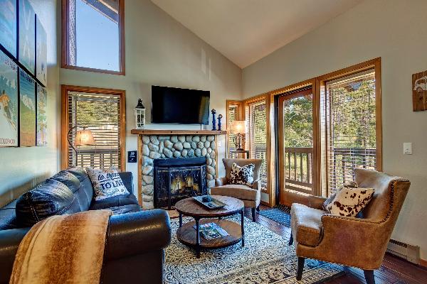 living area with panoramic views of the ski resort and Four O'Clock run.